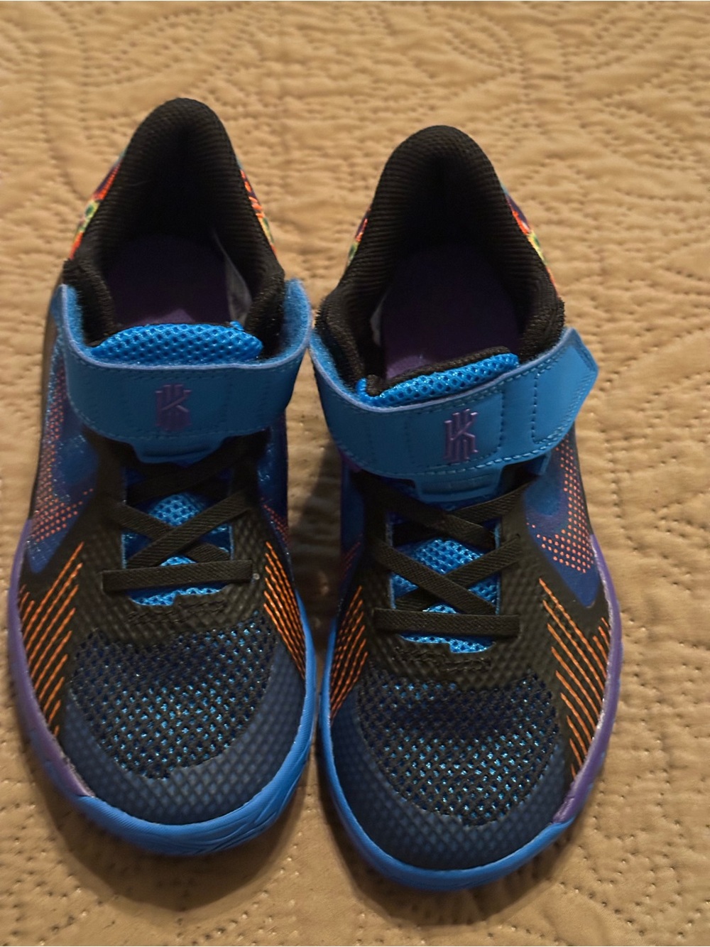 Nike Kids Blue and Black Athletic Sneakers with Orange Accents